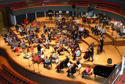The orchestra rehearse